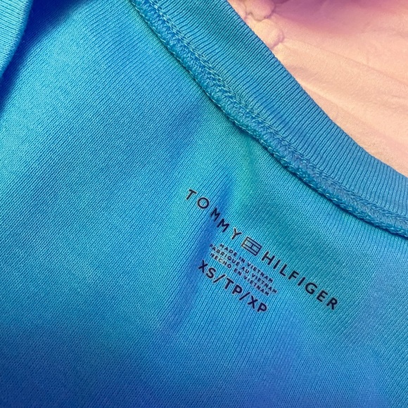 Two Tommy Hilfiger v-neck shirts. - Picture 1 of 2